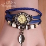 Reloj con brazalete de correa de cuero estilo retro color azul