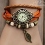 Reloj con brazalete de correa de cuero estilo retro color naranja